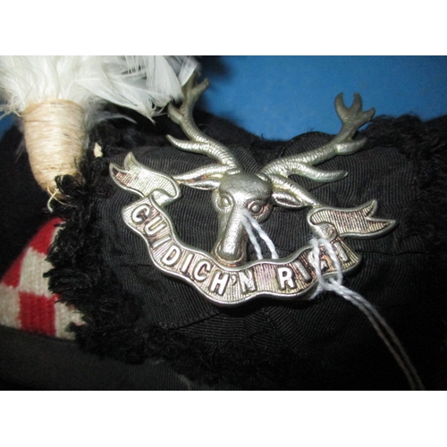 271 - A WWII Seaforth Highlanders beret, dated 1942, in pre-owned condition