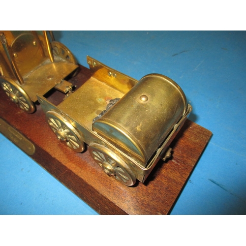 276 - A brass model of Stephenson’s Rocket locomotive on wood base, approx. length 33cm in used condition