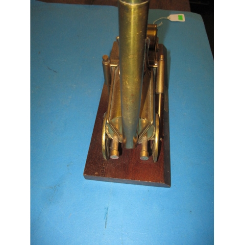 276 - A brass model of Stephenson’s Rocket locomotive on wood base, approx. length 33cm in used condition