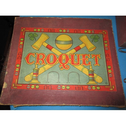 277 - An antique boxed table croquet set, having general age-related marks