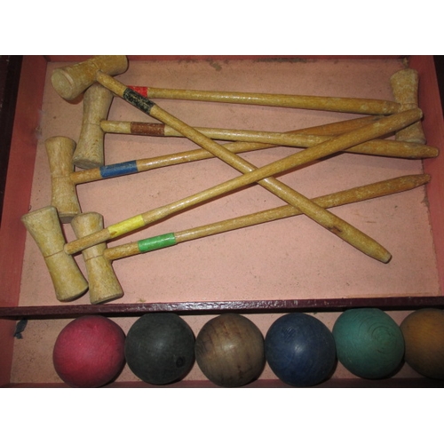 277 - An antique boxed table croquet set, having general age-related marks