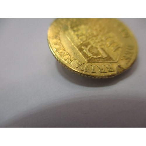 194 - A George III gold half sovereign, dated 1817, a circulated coin with fine definition of features, ni... 