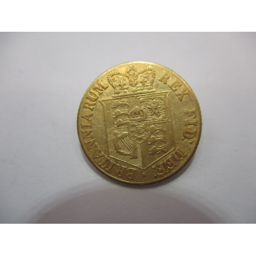 195 - A George III gold half sovereign, dated 1818, a circulated coin with fine definition of features
