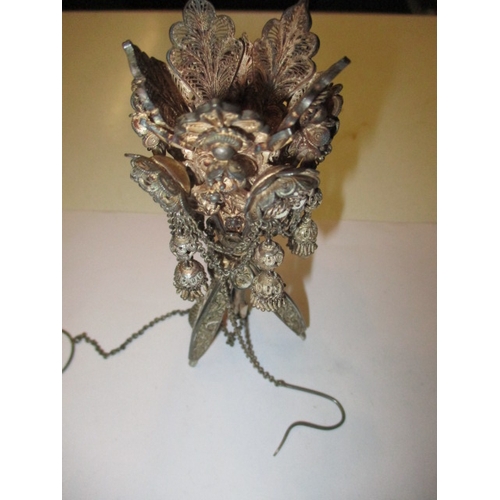 An antique Indian silver posey holder, gifted to Anne Millard c1890, ladies maid to the wife of the Duke of Connaught,  converts from a brooch to free standing, in good pre-owned condition
