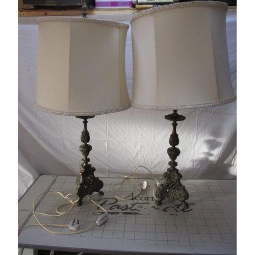 A pair of large Italianate brass table lamps, 20th century, in the form of torchieres, with cream silk shades, 115cm high, both PAT tested