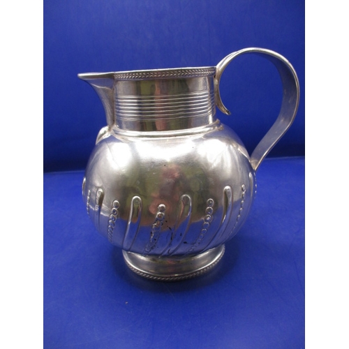A Georgian Sterling silver jug, approx. weight 393g. With use related marks