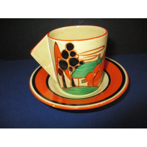 A Clarice Cliff conical coffee can in the ‘Trees & House’ design c1932 having Bizarre backstamp, with no observed damage or restoration just very minor enamel nips
