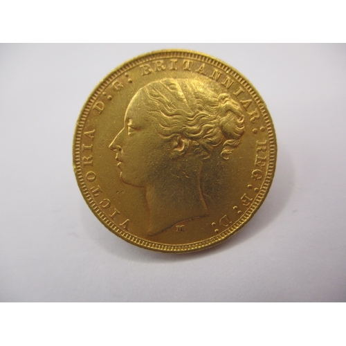 A Victorian gold sovereign dated 1879, a circulated coin with fine definition of features