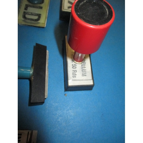 A quantity of rubber stamps, from a munitions supplier, all in useable ...