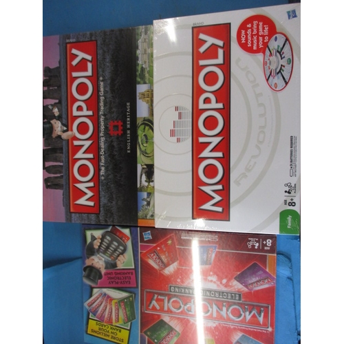 11 boxed Monopoly games, various editions all unopened condition