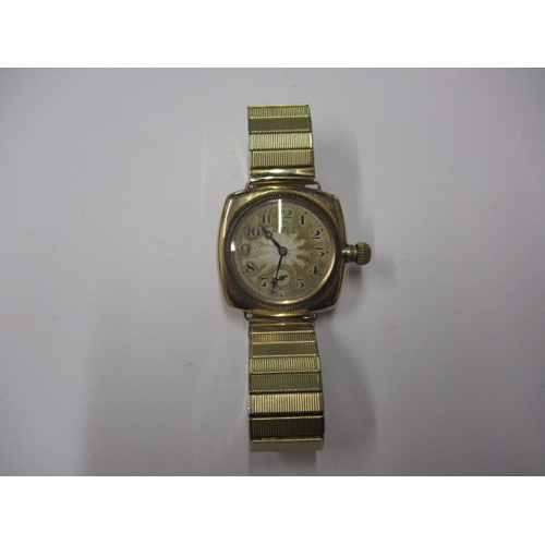 162 - A c1930s Rolex Oyster gold cased cushion wrist watch with later expanding bracelet, runs well when w... 