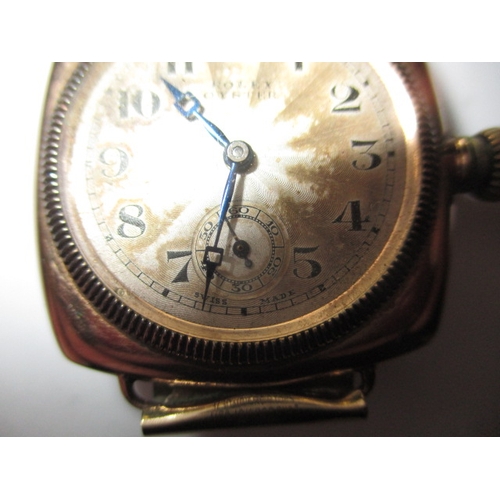 162 - A c1930s Rolex Oyster gold cased cushion wrist watch with later expanding bracelet, runs well when w... 