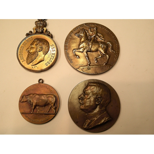 275 - Four antique and later Belgian bronze medallion awards, to include the 1910 Exposition, all in used ... 
