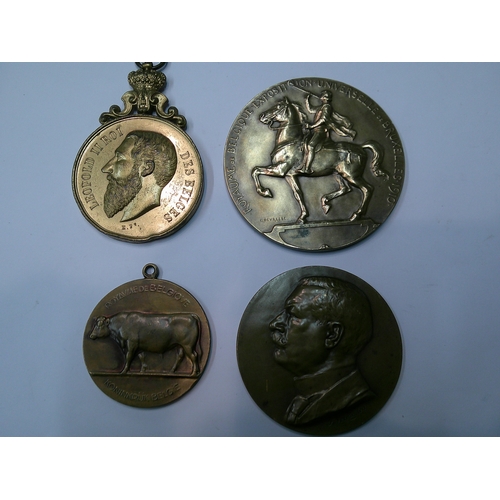 275 - Four antique and later Belgian bronze medallion awards, to include the 1910 Exposition, all in used ... 