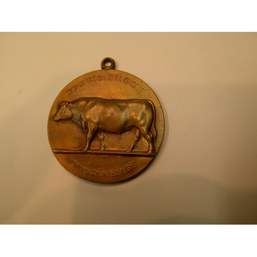 275 - Four antique and later Belgian bronze medallion awards, to include the 1910 Exposition, all in used ... 