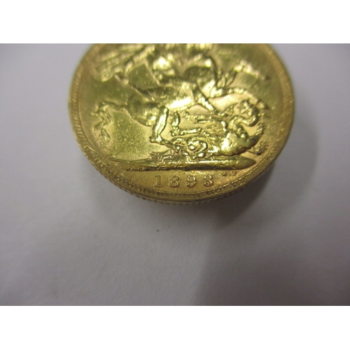 248 - A Victorian gold sovereign dated 1893, a circulated coin with very fine definition of features