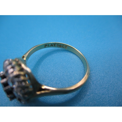 41 - An 18ct yellow gold and platinum  diamond and sapphire daisy ring, approx ring size ‘K+’, approx wei... 