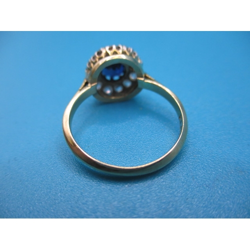 41 - An 18ct yellow gold and platinum  diamond and sapphire daisy ring, approx ring size ‘K+’, approx wei... 