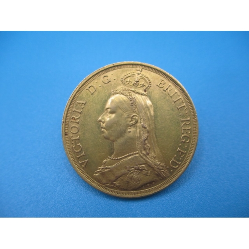 251 - A Victorian gold double sovereign dated 1887, a circulated coin with very fine definition of feature... 
