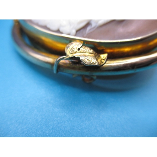 153 - A large yellow metal mounted cameo brooch, in useable pre-owned condition