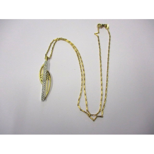 121 - A 750 yellow and white gold necklace and pendant with central row of diamonds, approx linear length ... 