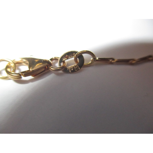 121 - A 750 yellow and white gold necklace and pendant with central row of diamonds, approx linear length ... 