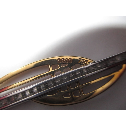 121 - A 750 yellow and white gold necklace and pendant with central row of diamonds, approx linear length ... 