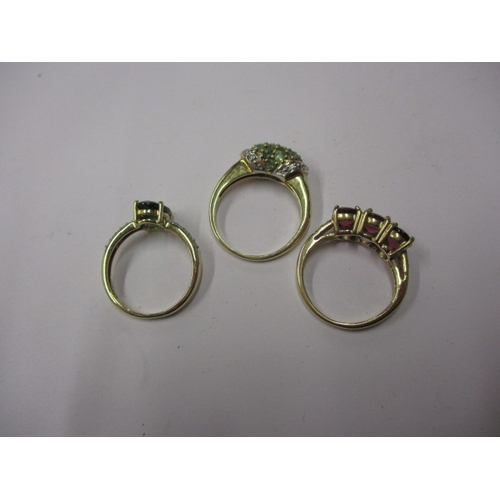 78 - Three 9ct yellow gold dress rings, various stones, sizes I to J, approx gross parcel weight 6.4g