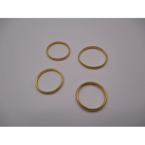 Four vintage 22ct yellow gold wedding bands, various sizes, approx gross parcel weight 6.8g ,all with use-related marks