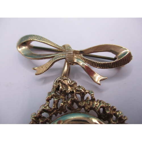 124 - A vintage 9ct yellow gold locket brooch/pendant, in useable pre-owned condition, approx weight 13.3g