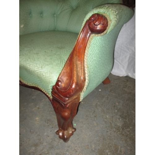 338 - An early 20th Century show wood button back parlour chair. Age and use related marks