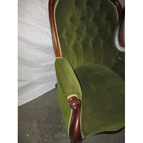 339 - A vintage green upholstered button back show wood parlour chair. In pre-owned condition with user re... 