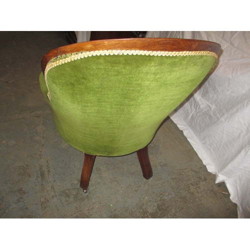339 - A vintage green upholstered button back show wood parlour chair. In pre-owned condition with user re... 
