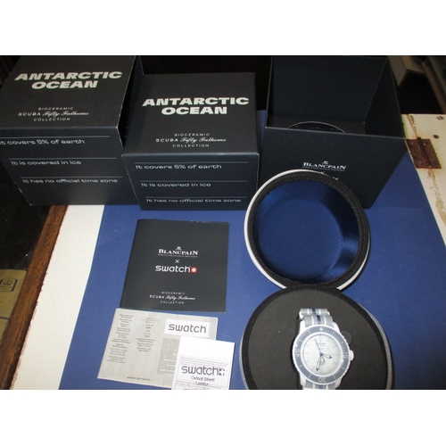 171 - A Blancpain X Swatch scuba watch, Antarctic ocean fifty fathoms in box with paperwork, automatic in ... 