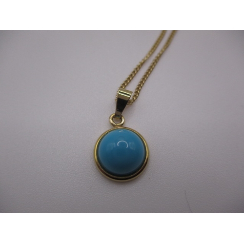 130 - A 9ct yellow gold necklace with turquoise pendant, approx linear length 44cm, in near unused conditi... 
