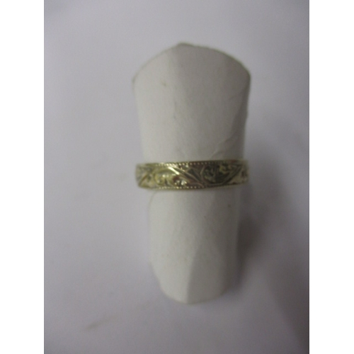 94 - A vintage 750 gold wedding band, approx ring size ‘L+’, approx width 3.8mm, approx weight 2g, in use... 