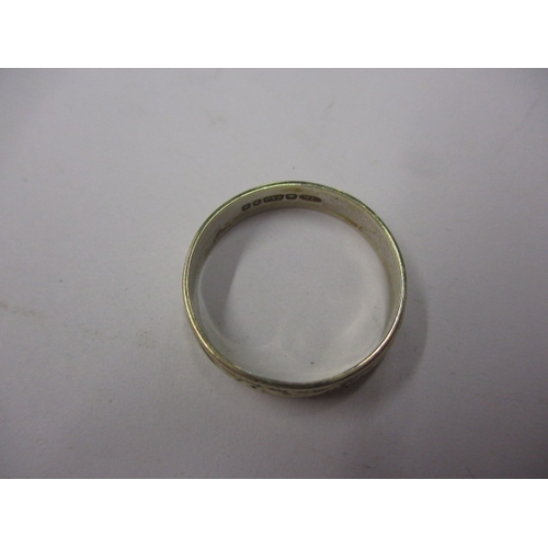 94 - A vintage 750 gold wedding band, approx ring size ‘L+’, approx width 3.8mm, approx weight 2g, in use... 