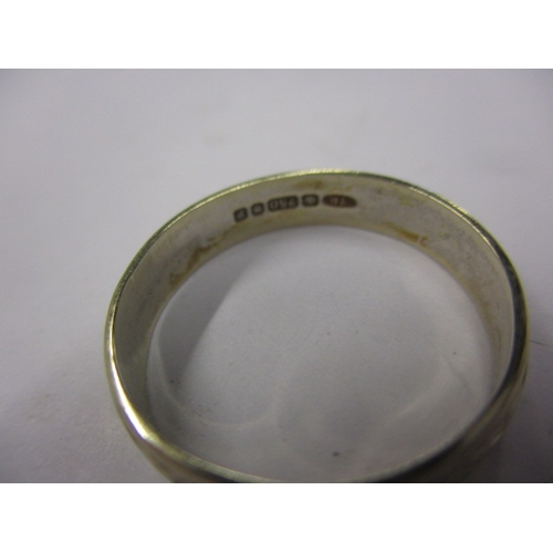 94 - A vintage 750 gold wedding band, approx ring size ‘L+’, approx width 3.8mm, approx weight 2g, in use... 