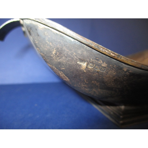 209 - A 1930s Art Deco sterling silver dish  by Walker & Hall, well tarnished and with original spoon, app... 