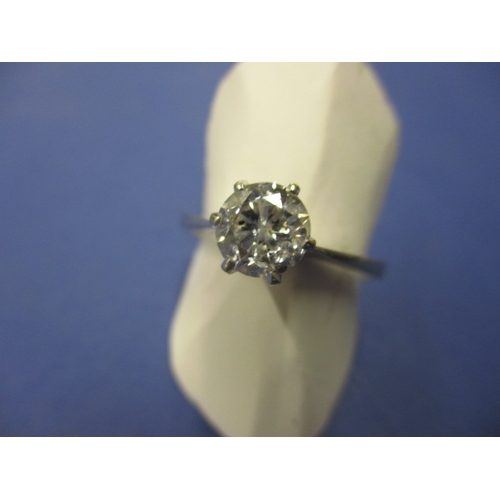 21 - An 18ct white gold diamond solitaire ring, the stone certificated as 1.02ct, approx ring size ‘N+’ a... 