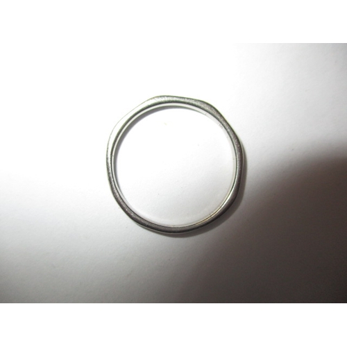 97 - A platinum wedding band, approx ring size ‘N’, approx weight 1.7g, in useable pre-owned condition