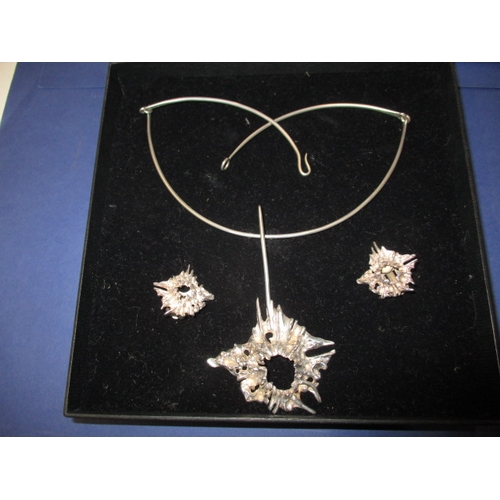 188 - A Juhls silver gallery of Norway designer necklace earring set, in original box with booklet