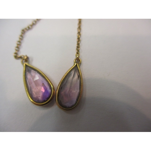 143 - A vintage gold and amethyst necklace, approx chain length 40cm, approx gross weight 3g, in useable p... 