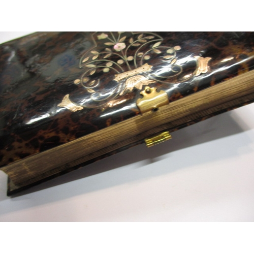 293 - A Victorian Church of England pocket common prayer book, having gold inlaid cover, missing catch cli... 