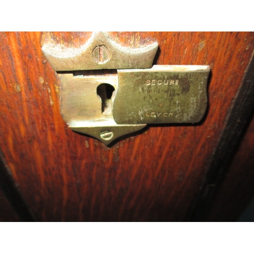 334 - An early 20th century oak smokers cabinet in the form of a bank safe, approx height 32cm, use relate... 