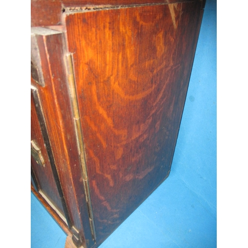 334 - An early 20th century oak smokers cabinet in the form of a bank safe, approx height 32cm, use relate... 