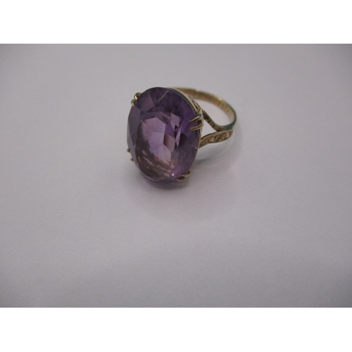 31 - A vintage 9ct yellow gold dress ring with single amethyst coloured stone, approx ring size ‘P’, appr... 