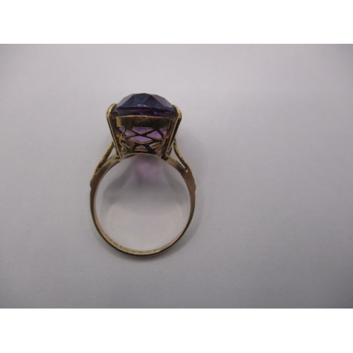 31 - A vintage 9ct yellow gold dress ring with single amethyst coloured stone, approx ring size ‘P’, appr... 