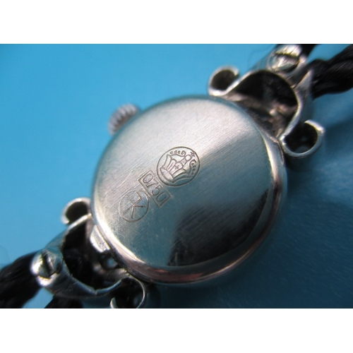 158 - A vintage ladies cocktail watch, the case marked 750 for white gold with diamond set shoulders, the ... 