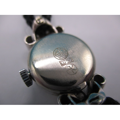 158 - A vintage ladies cocktail watch, the case marked 750 for white gold with diamond set shoulders, the ... 